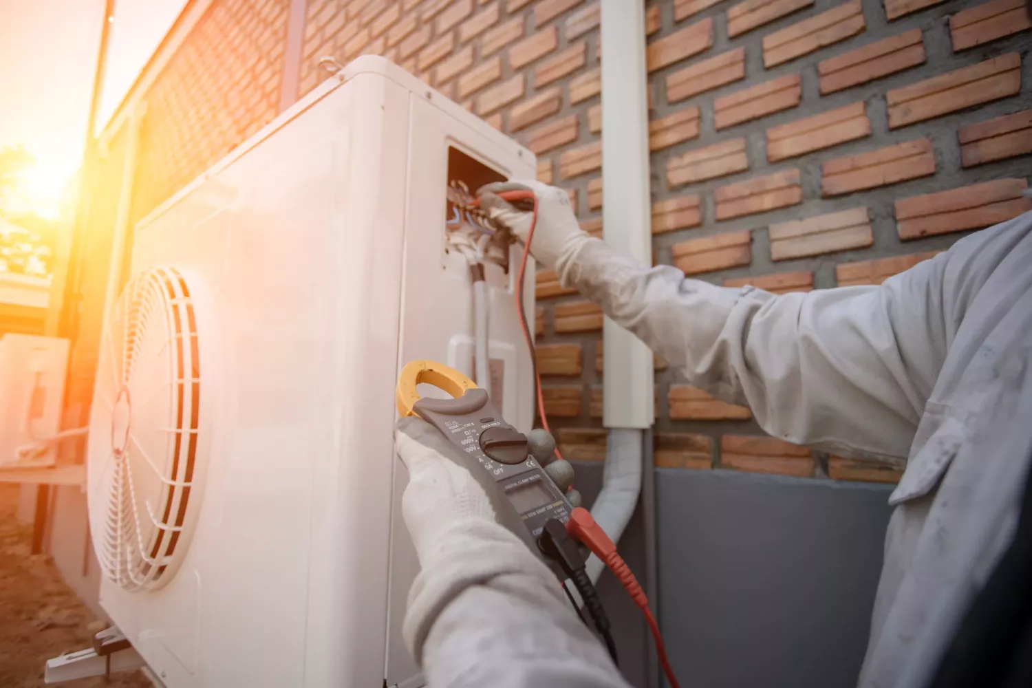 Air Conditioning Technician and A part of preparing to install new air conditioner. Technician vacuum pump evacuates and checking new air conditioner