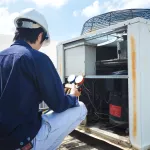 Technician is checking air conditioner