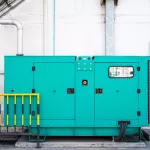 Green auxiliary diesel generator for emergency electric power  outage in the factory.