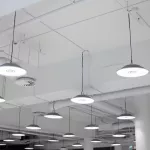 Shopping center led lighting. Ceiling lights in the mall. Ventilation and water pipes. Fire alarm system