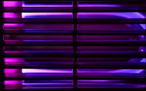 Ultraviolet lamp for disinfection and sanitation. UV lamp for air disinfection. UV disinfection. Concept of cleanliness and hygiene, lamp's blue light kills bacteria and viruses.