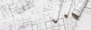 architect design working drawing sketch plans blueprints and making architectural construction model in architect studio,flat lay