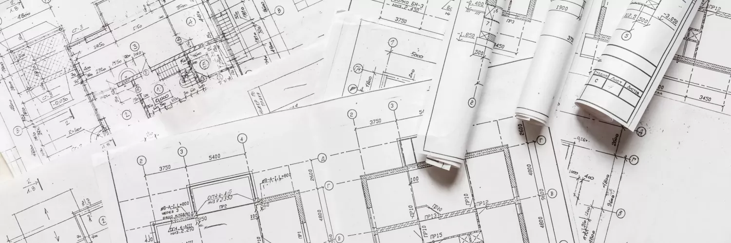 architect design working drawing sketch plans blueprints and making architectural construction model in architect studio,flat lay