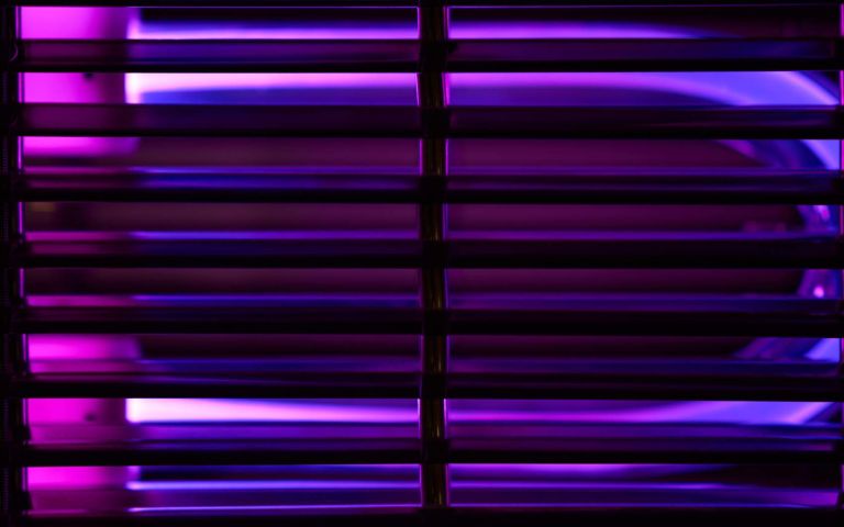 Ultraviolet lamp for disinfection and sanitation. UV lamp for air disinfection. UV disinfection. Concept of cleanliness and hygiene, lamp's blue light kills bacteria and viruses.